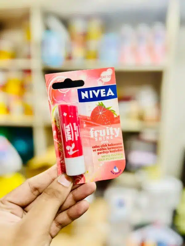 NIVEA Fruity Shine 4.8g Lip Balm | 24 H Melt in Moisture Formula | Natural Oils | Glossy Finish - Image 2