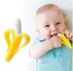 Banana shaped baby gum cleaner with ultra soft bristles