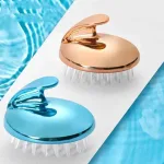 Hand held silicone hair wash brush with cushion airbag base