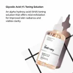 AHA glycolic toner applied with a cotton pad in the evening