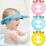 Baby shampoo shield cap to keep water off the face