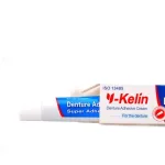 Y-Kelin denture cream that helps seal out food particles