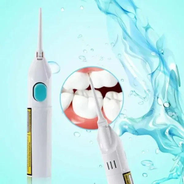 Rechargeable oral irrigator being used along the gumline