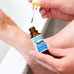 Salicylic and lactic acid topical solution for corns and calluses